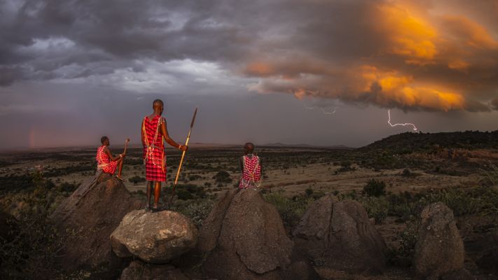 Guardians of the Storm:  Maasai Warriors Under the Thunderous Sky